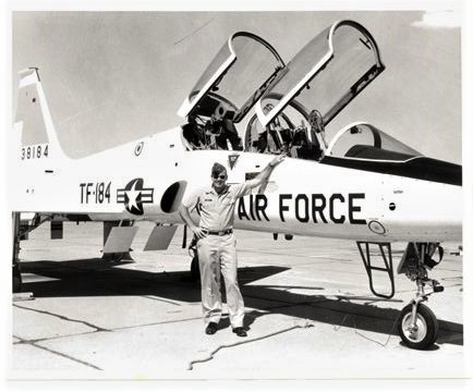 Don standing with Air Force airplane.